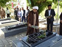 مزار شهدای چهاربرج غبارروبی و گلباران شد